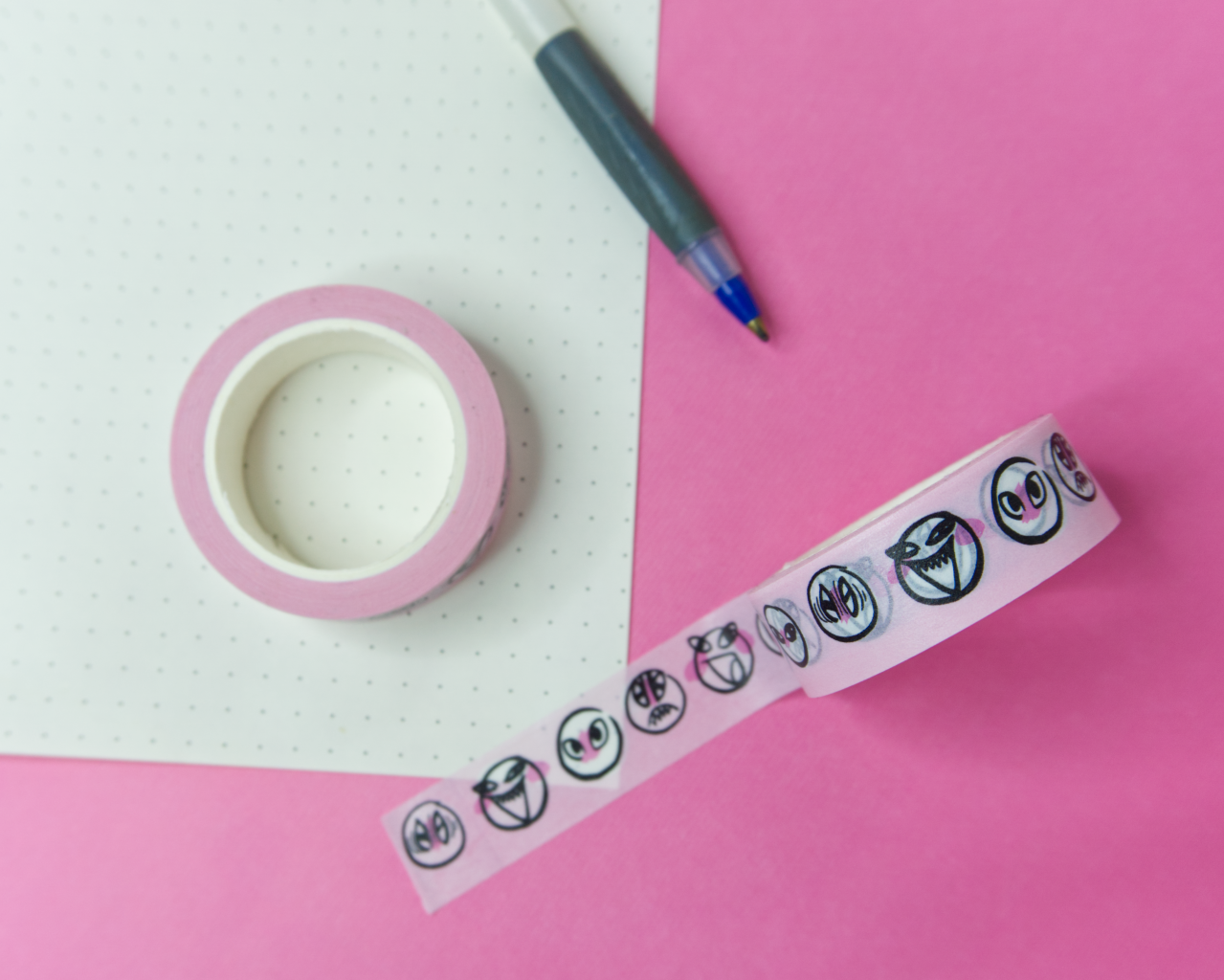 Five stages of Lee tape unrolled and placed on dotted paper.